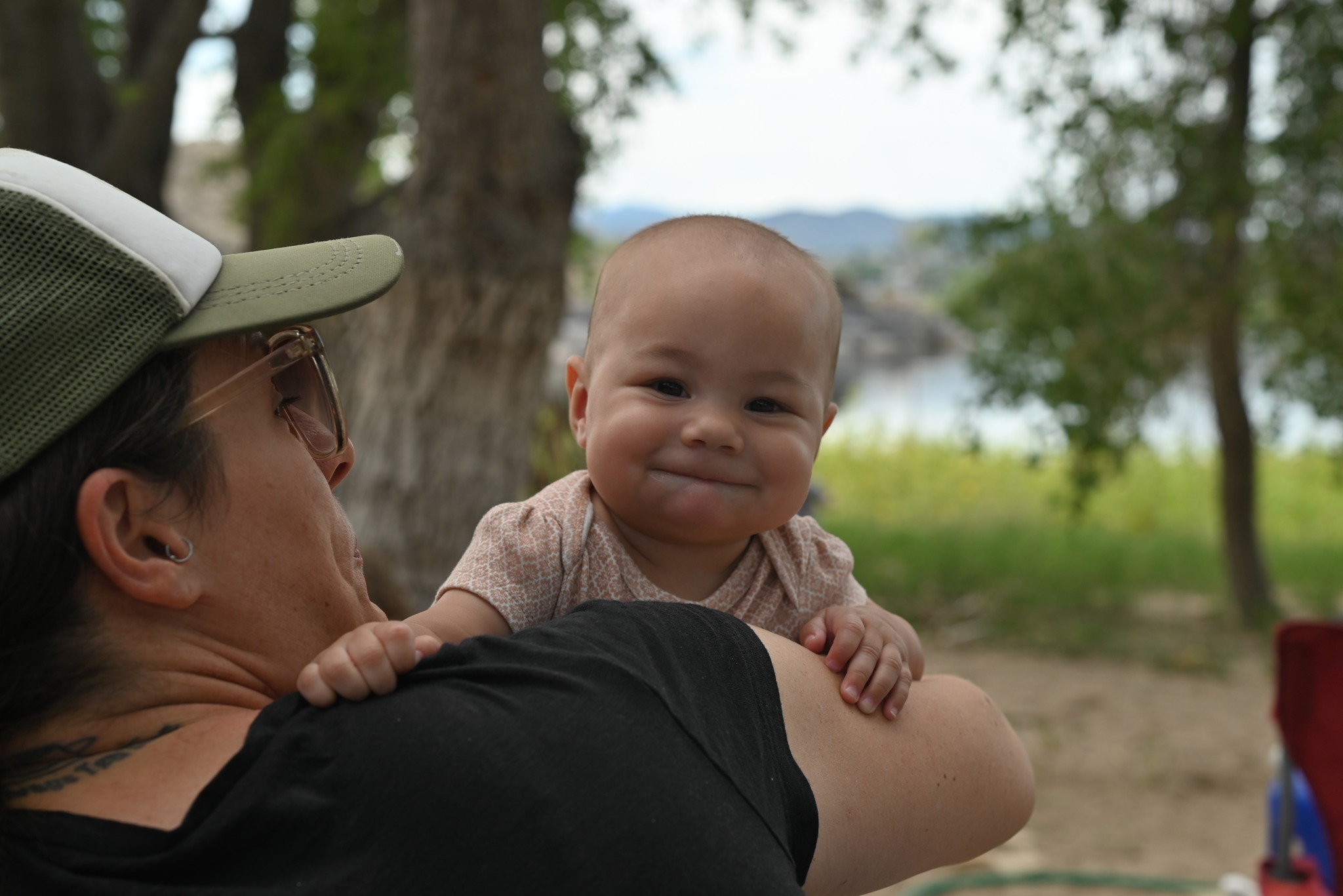 baby smiling outside